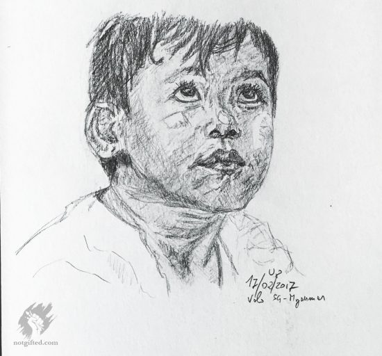 Asian kid drawing